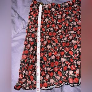 two shein skirts one plain black and other has flowers :) both xs